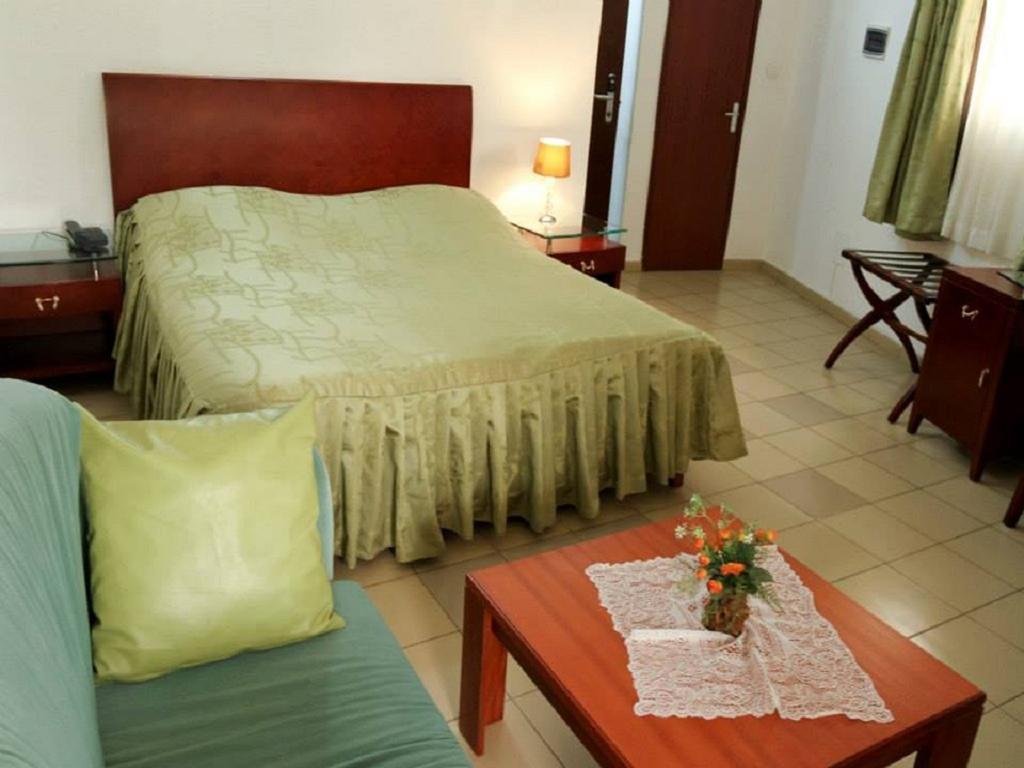 Paradise Hotel Lomé Quarto foto