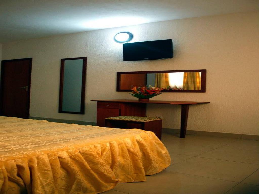 Paradise Hotel Lomé Quarto foto
